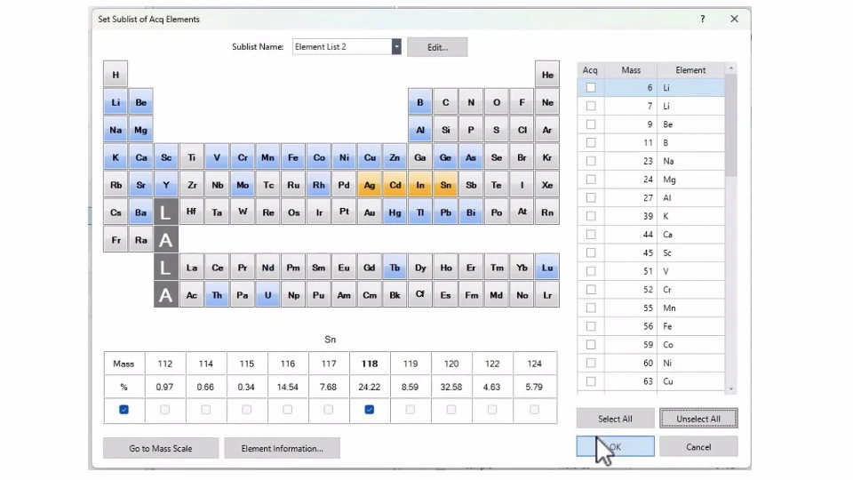 Interactive periodic table interface showing elements in blue, orange, and gray. Selected elements are shown in orange. Selection boxes on the right, with mass details below. Cursor on 'OK'.